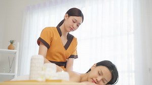Woman receiving a back massage at a spa Free Stock Video Footage
