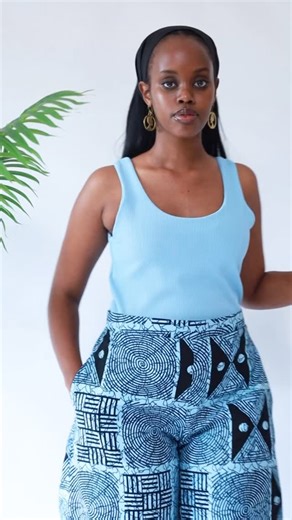 Bold in Africa on Instagram: "Put some pep in your step with this @shurea.yasmin pant set. @shurea.yasmin pants - Ugx180,000 @shurea.yasmin top - Ugx100,000 Nairobi brass ring - Ugx80,000 Nairobi brass earrings - Ugx70,000 #madeinuganda Available in store 💙🤍"