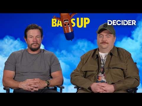 Mark Wahlberg & Paul Walter Hauser Talk Swallowing Condoms for Absurd ‘Balls Up’ Scene