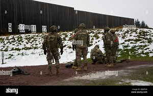 ANSBACH - U.S. Soldiers with the 2-227 General Support Aviation Battalion, 1 Air Cavalry Brigade conduct M4 rifle and M9 pistol zero and qualification live fire training at the Oberdachstetten Range complex, in Bavaria, Germany, Dec. 11, 2017. (U.S. Army photo/video by Visual Information Specialist Eugen Warkentin Stock Photo - Alamy