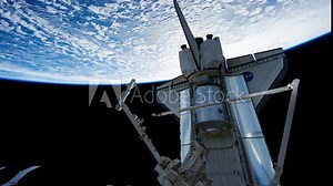Earth and shuttle as seen through window of International Space Station STS . Elements of this image furnished by NASA.