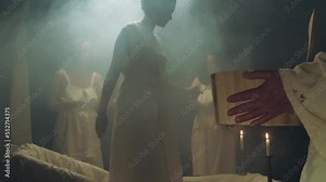 The maids help their noblewoman into the bath. Cinematic stylistic shot