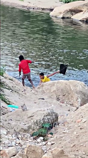 Flying kites and making leftovers by the riverbank.