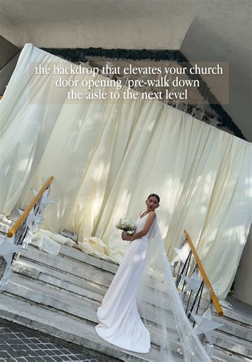 Elegant Bride Entrance with Dramatic Drapery