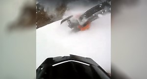 The Snowmobile Won't Stop Rolling in This Crazy Crash