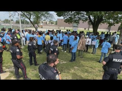 TORONTO PROTEST l Violence breaks out at a protest in Toronto injuring 9 people