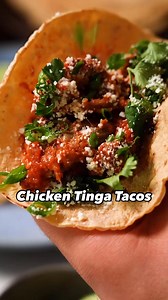 Not only is this recipe for tinga, the smoky Mexican tomato sauce, absolutely delicious but it comes together with just a few simple ingredients 👏. Grab some tortillas and have Chicken Tinga Tacos for dinner with the recipe in the comments. 🌮: Jenn Louis, 🎥: Matthew Francis | Food & Wine