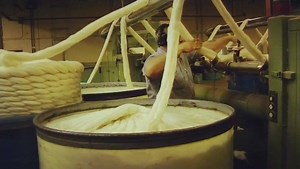 Gilling wool top in preparation for yarn spinning -- the process evens out carded or combed top (product of combing the fibers) and makes it suitable for yarn spinning. One of the many steps of our Sheep to Shelf® supply chain. Montana Grown, Made in USA. | Duckworth