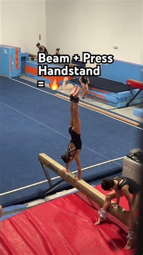 Press handstand on beam = not easy 😎🔥 #gymnasticshorts #gymnastlife #gymnast #presshandstand #fyp
