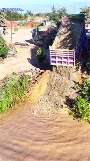 Massive Landfill Project Underway: Bulldozers & Dump Trucks