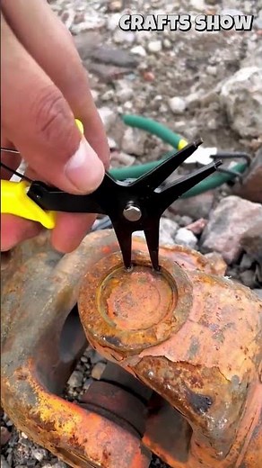 🛠️🔩 Removing a Retaining Ring with Specialized Circlip Pliers