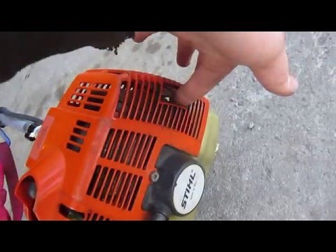 cold starting a Stihl FS 80 commercial weed wacker