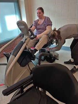 Quadriplegic stand and pivot transfer to Nustep exercise bike. SCI BSS tetraplegic