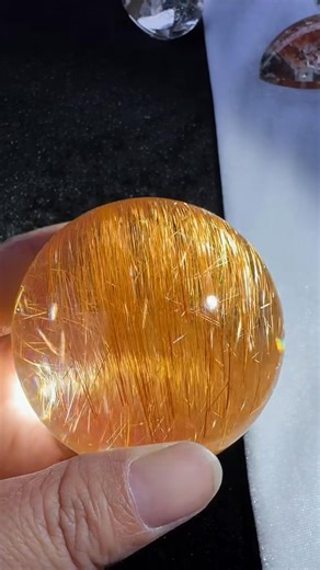 Golden rutilated quartz sphere Diameter 64mm | Quana Crystal