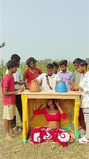 The girl is lying under the table to cheat.