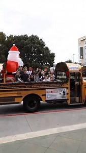 Mister McKinney and the Houston History Bus bringing joy (with the help of #SantaClaus) to the students at St. Anne Catholic School! (The 1940 church and bell tower by noted architect Maurice J. Sullivan and 1929 campus of #StAnneCatholicSchool is on Mister McKinney's Historic Houston's tours and one of his favorite churches. www.MisterMcKinney.com) JOIN IN THE FUN this year! #DontMissOut -->> Come see River Oaks Christmas Lights in Houston TX on board the famed, open-air Houston History Bus NOW