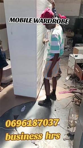 Assembling a Modern White Wardrobe in a Warehouse