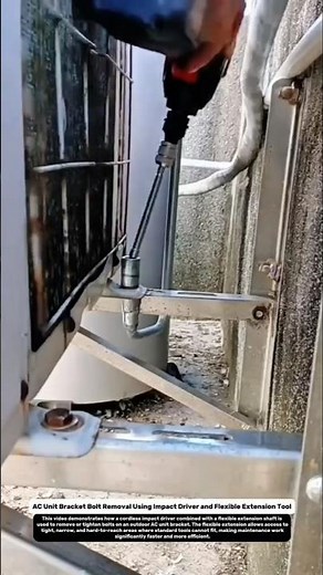 AC Unit Bracket Bolt Removal Using Impact Driver and Flexible Extension Tool.