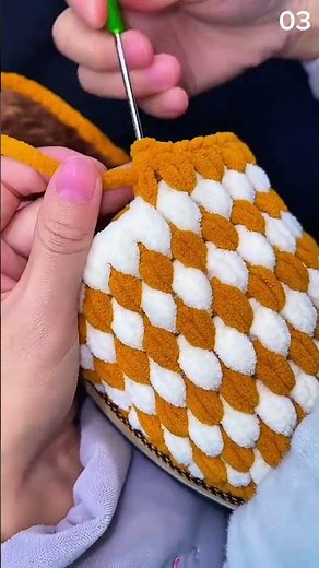 The embossed scale knitting technique produces a beautiful texture.