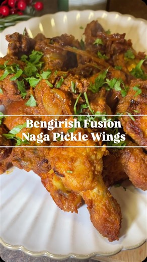 Carrie - The Irish Bhabi 🍀 on Instagram: "Naga Pickle Chicken Wings 🌶️ Recipe Ingredients Chicken wings 1kg 1/2 tsp salt 1 tsp paprika 1/2 tsp chilli powder 1/2 lemon 1 tbsp garlic and ginger paste 1/2 cup cornflour or rice flour (I used rice flour) For the sauce 1 onion 2 tbsp tomato puree 1 tsp chilli powder 1 tsp paprika 1 tsp salt 1 tsp garam masala 1/2 tsp garlic powder 1/2 tsp onion powder 1 tbsp naga pickle Oil Coriander Method Coat wings in all the chicken ingredients listed along with