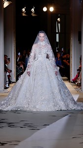 The romantic #CoutureBride exude an enchanting and ethereal aura, floating onto the runway in a mesmerizing dress that crafts a sense of regal charm and mysterious allure. Discover the “Midnight Scent” at ZuhairMurad.com Original Music composed by @sebperrinparis Makeup by @charlottetilbury @sofiatilbury #ZuhairMuradMariage #ZuhairMurad | ZUHAIR MURAD