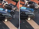 Shocking moment group attack man and hit him over the head with brick