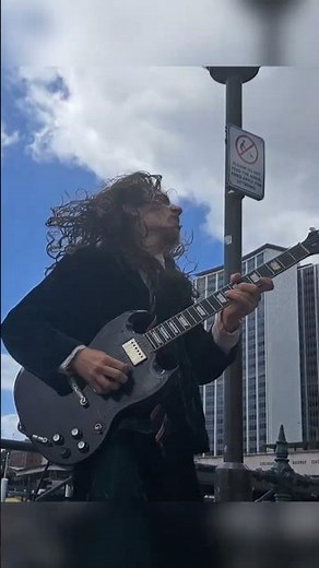 AC/DC - Gimme A Bullet by Angus Young Street Performer!