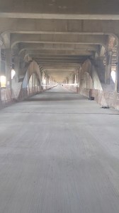 Starting tonight at 4 p.m., you can cross the Cuyahoga River in a unique way: By walking across the lower level of the Veterans Memorial Bridge. Usually closed off to the public for most of the year, this weekend the space will be open — giving a peek at Cleveland's streetcar and transportation past, along with stellar views of the city skyline, underneath a rumbling bridge. | Cleveland Magazine