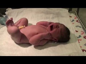 Baby being born