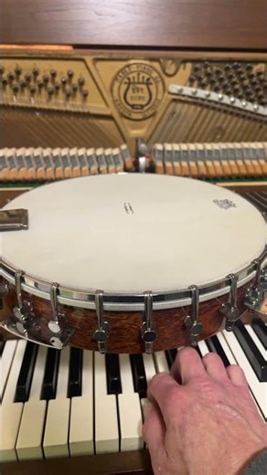 Banjo head tuning is about pitch, not tension. Use sympathetic resonance to tune your banjo head.