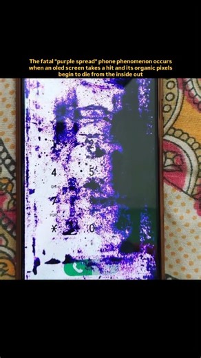 Memoir World on Instagram: "The “purple spread” is a common but fatal issue seen in damaged OLED screens. When the display takes a hard hit, the organic compounds inside the pixels begin to break down, causing a dark purple or black liquid pattern to spread across the screen. The damage grows over time as more pixels die from the inside out. It’s irreversible once it starts, since OLED panels rely on self lit pixels rather than a backlight, meaning the dead areas can’t recover or be patched. Fol