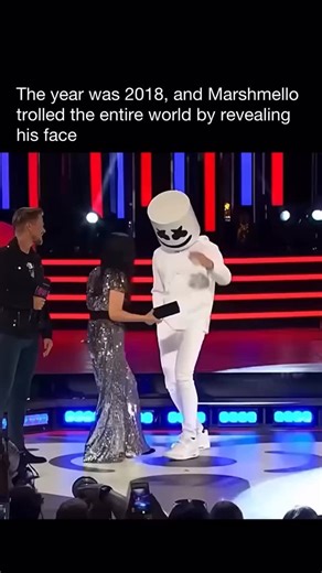 Cinematic scenes on Instagram: "At the 2018 iHeartRadio Much Music Video Awards, the mystery of Marshmello’s identity reached a fever pitch. When he was called to the stage to accept the award for Best EDM/Dance Artist, the “revelation” finally happened. “Marshmello” walked up to the mic, grabbed his signature white bucket, and slowly lifted it off as the crowd went wild. Instead of the producer everyone expected, the person underneath was none other than Shawn Mendes! Shawn gave a cheeky smile 