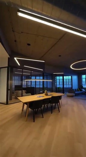 Empty industrial loft with exposed ceiling and concrete floor — transform into a premium tech office