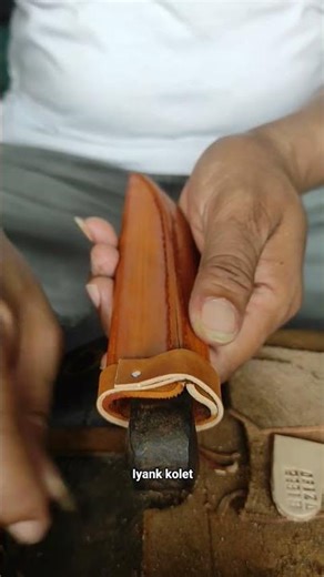 one nail pierced the leather sheath of the knife #knifesheath #wood #knifesheath