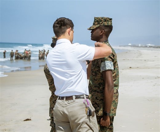 Missionary pins Marine in historic promotion ceremony