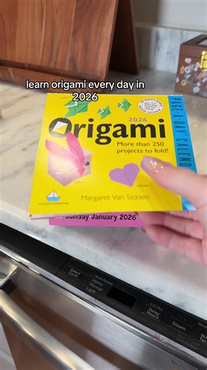 page a day calendars are so fun, this one shows you how to make origami every day and each page doubles as your origami paper #origamicalendar #pageadaycalendar #2026calendar #tiktokshopjumpstartsale #tiktokshopcreatorpicks