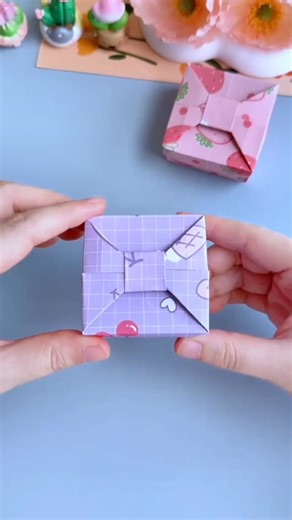 paper crafts creator on Instagram: "Elegant Origami Gift Box #OrigamiGiftBox #DIYCrafts #PaperFolding #HandmadeGiftBox #CreativeOrigami #EasyOrigami #GiftWrappingIdeas #PaperCraft #OrigamiArt #DIYPackaging"