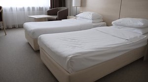 Two Single Beds Cozy Hotel Room Stock Footage Video (100% Royalty-free) 1104373419 | Shutterstock