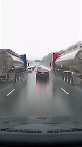 Semi-Truck Jackknifes on Wet Highway Harrisburg, Pennsylvania — January 12, 2025 A harrowing scene unfolded on a major interstate Wednesday afternoon as a heavy tanker truck lost control on a slick, rain-drenched highway. The commercial vehicle, traveling at highway speeds, suddenly jackknifed, blocking multiple lanes of traffic and sending smaller passenger cars scrambling for safety. Dashcam footage from a nearby motorist captured the terrifying moment the red semi-truck began to fishtail. As 