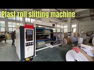 Plastic film roll slitting and rewinding machine