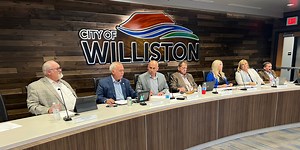 Williston mayor returns in person for first city commission meeting since July