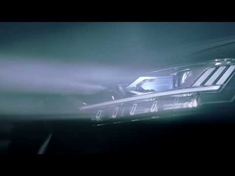 Matrix LED headlight with dynamic laser spot