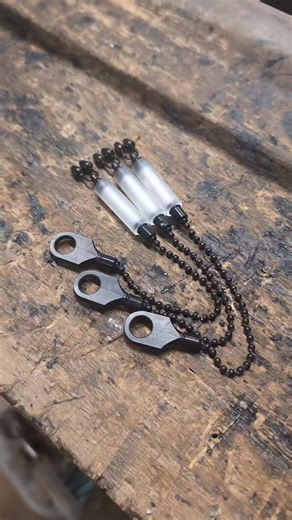 Skinny frosted bobbins with green isotopes..... Unfortunately frosted is only available in a clear acrylic but by adding a coloured isotope we can achieve the colours you want | Dobbins Bobbins