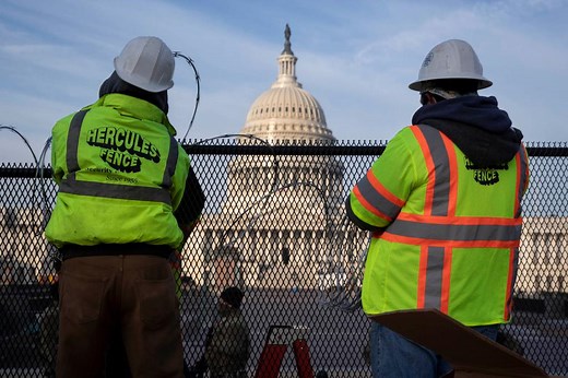 Workers install razor wire around US Capitol ahead of Biden inauguration