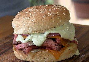 Shaved tri tip, reversed seared to a medium rare, shaved paper thin toasted and topped with an avocado, jalapeño mayo, two types of cheddar and shaved red onion. YUM! | Ballistic BBQ