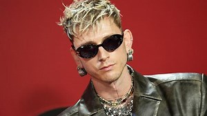 Machine Gun Kelly Covers His Upper Body With Blackout Tattoo