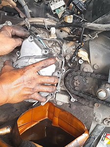 Opening the engine magnet section on the Honda Blade New motorbike | Aeon