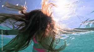Woman's hair underwater of the sea