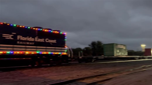 12/6/2025 - FEC's Christmas train arrives in unsettled weather in New Smyrna Beach Florida. | BP and Riversong Railway Photography