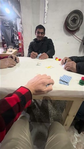 Here at Russo's, Pumba and Hernan are playing truco and envido with the masters of truco